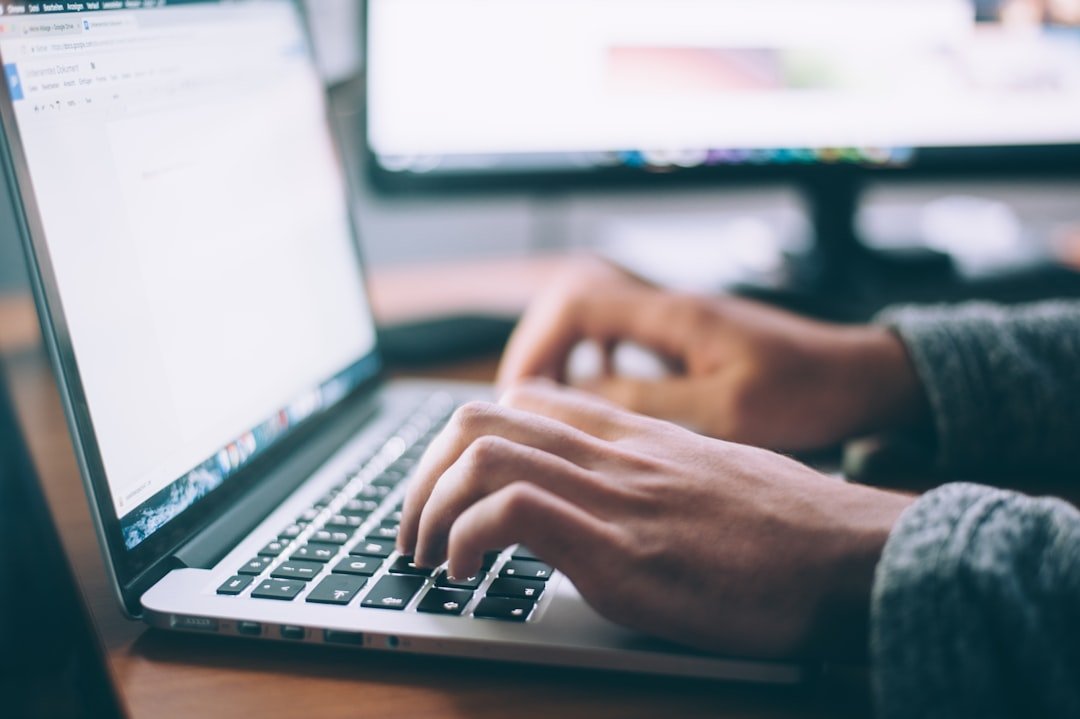 Keyboard Tester: How to Check Every Key Quickly - person using online keyboard tester on laptop