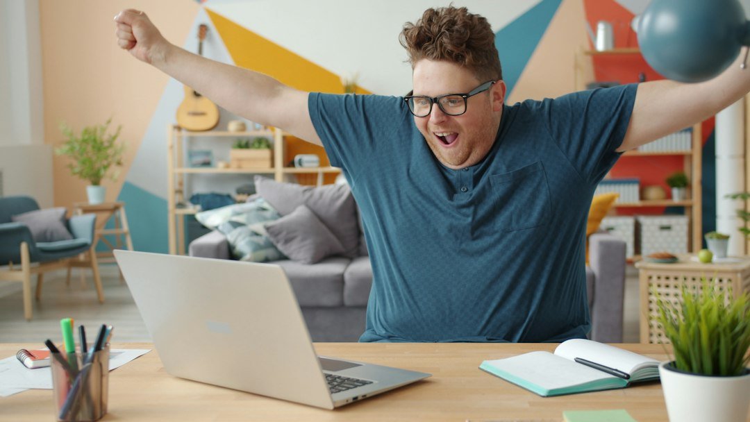 Best Apps for Fitness: Top Picks for Gamers Who Sit Long Hours - gamer stretching at desk
