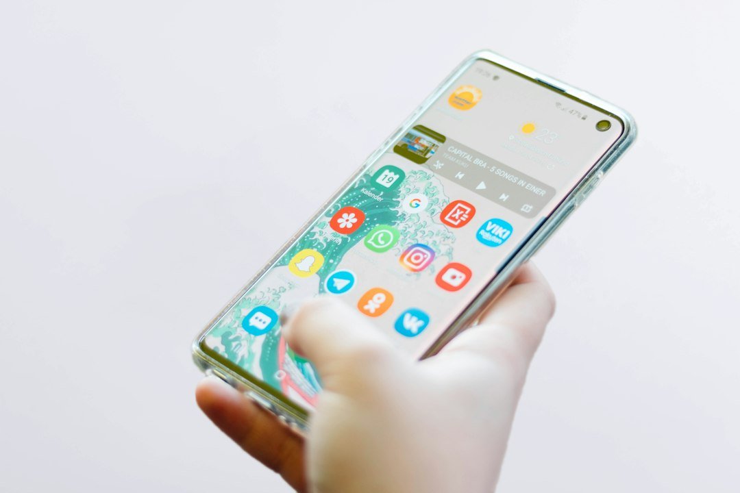 CPS test mobile: How to Measure Click Speed on Your Phone - person tapping smartphone screen