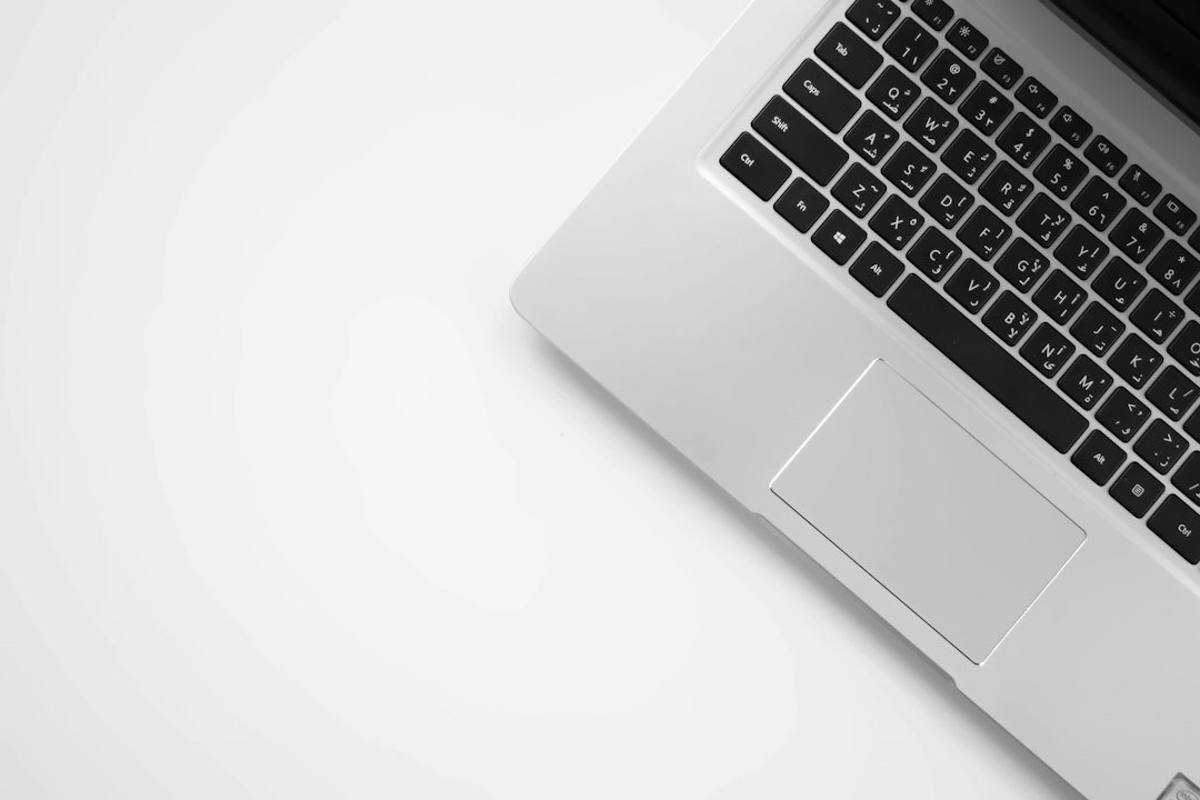Why Is My CPS Lower on Laptop Trackpad Than Mouse? - laptop trackpad click close up